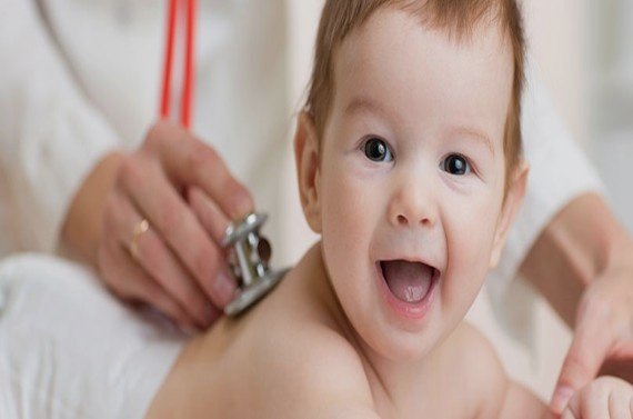 How does Dr. Ramani Ranjan monitor a child’s growth and developmental milestones?